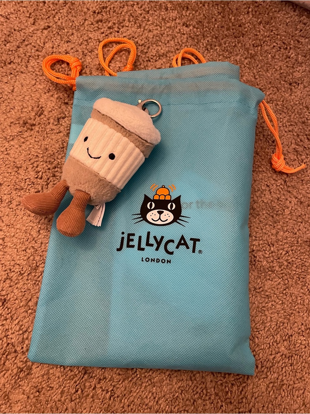 Jellycat Beige & Cream Cupcake Keychain Plush with Blue Drawstring Bag